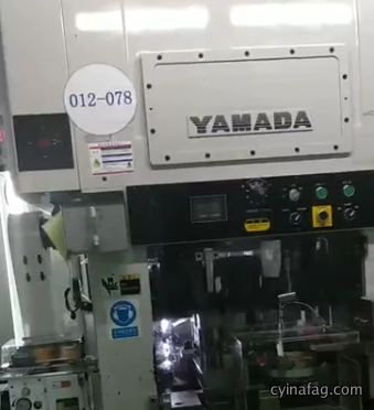 YAMADA punching machine with JoeSure high-speed clip feeder in use