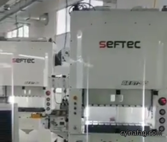 SEFTEC punching machine with JoeSure high-speed clip feeder in use